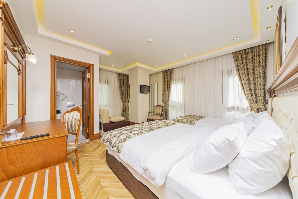 Spectra Hotel - Chambres