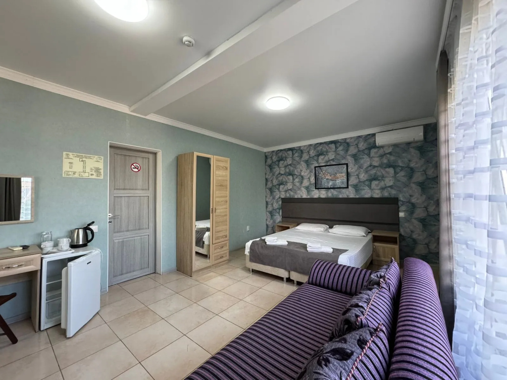 Standard Quadruple room with balcony