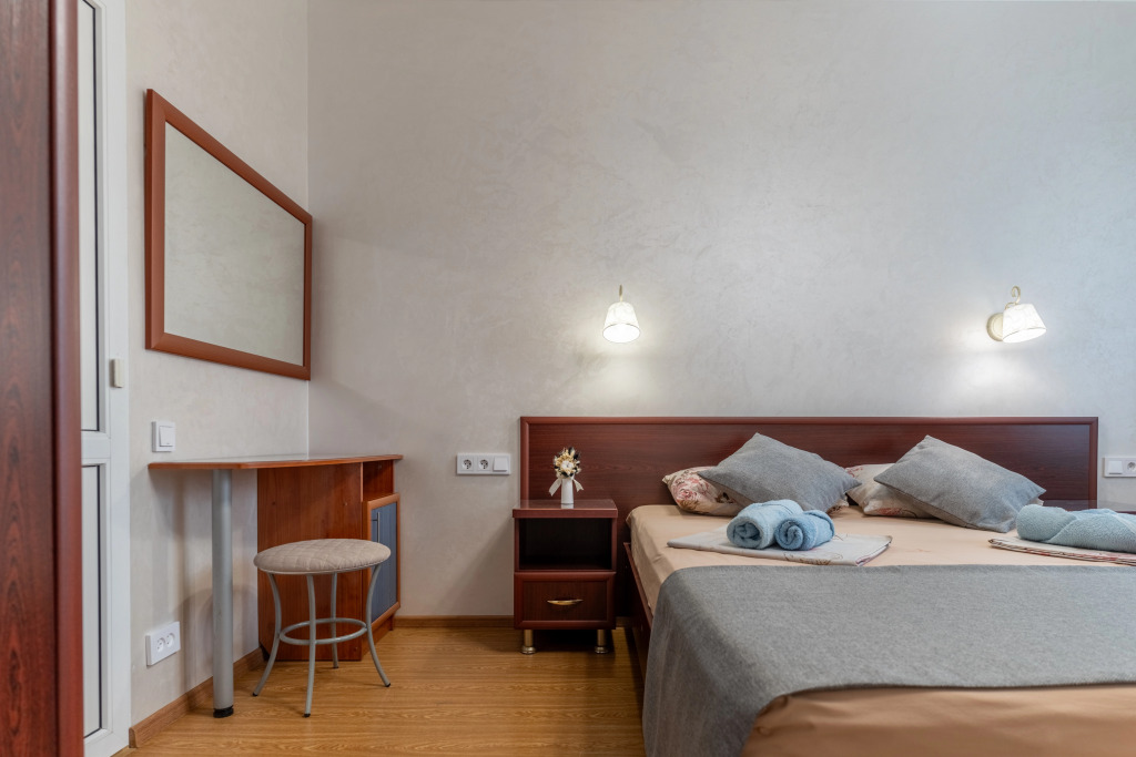 Двухместный номер Standard с балконом и с красивым видом из окна двуспальная кровать в Гостевой дом