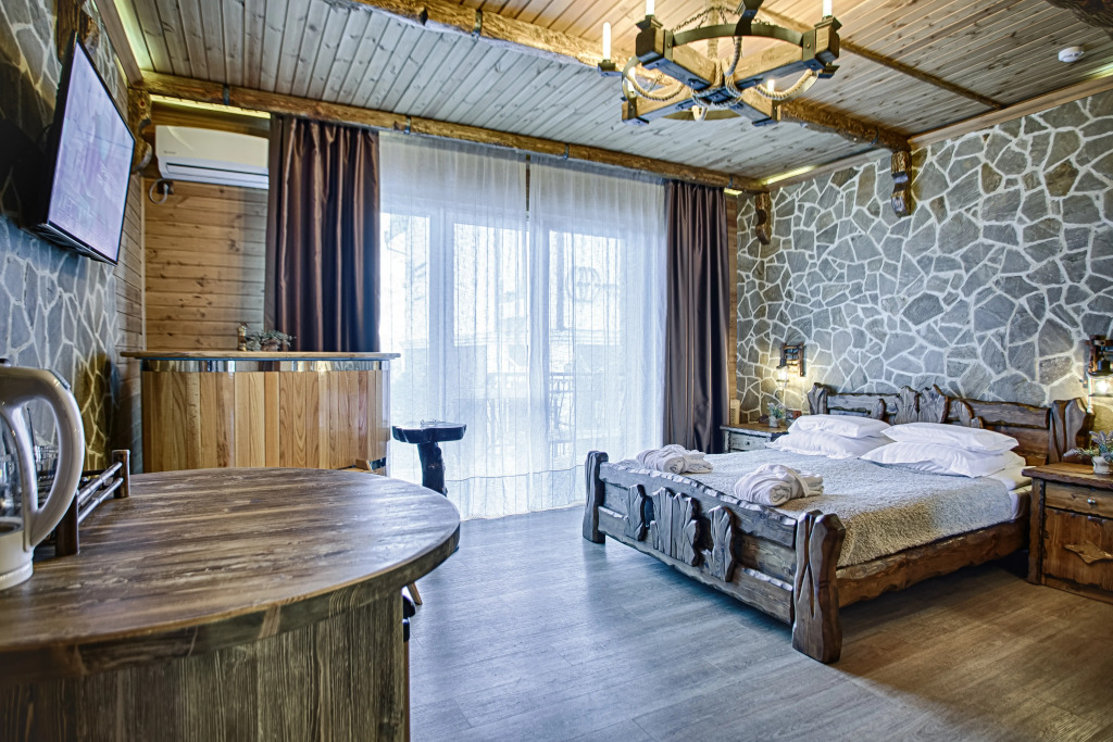 Двухместный 25 люкс с террасой с видом на море двуспальная кровать в Exclusive Hotel&Apartments