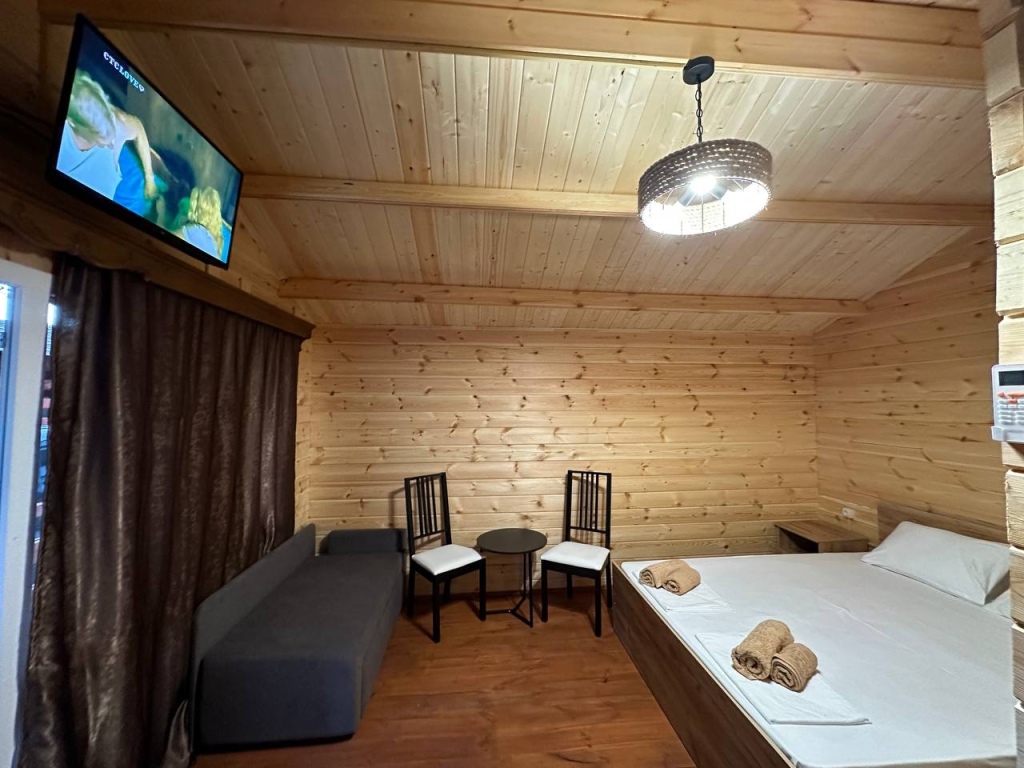 Трёхместный номер Economy с балконом и с красивым видом из окна в Holiday park