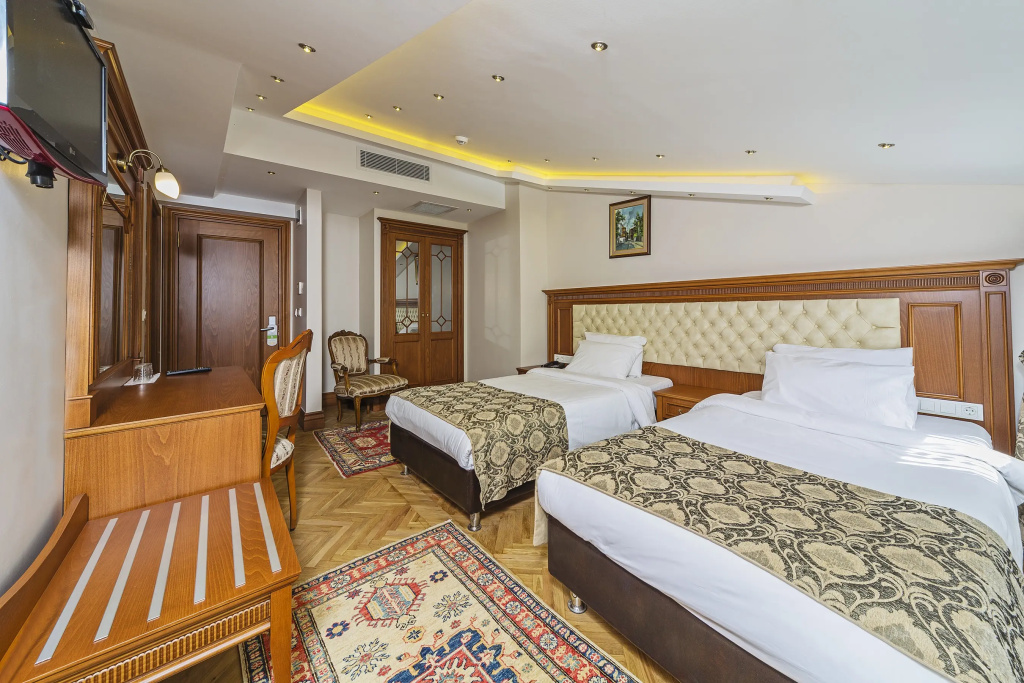 Spectra Hotel - Chambres
