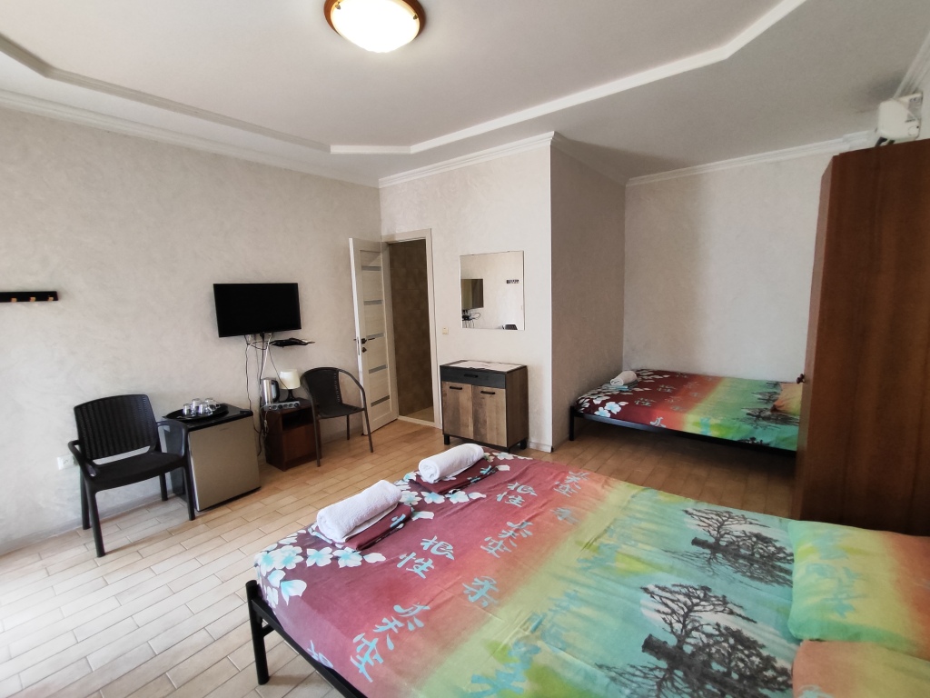 Четырёхместный номер Comfort с красивым видом из окна в Фазенда