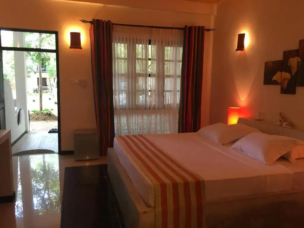 Flower Garden Eco Village Hotel - Chambres