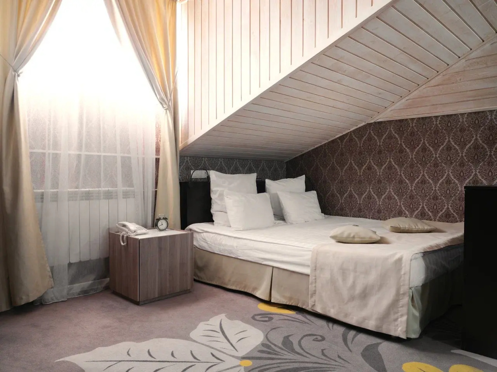 Kupecheskij Dvor Hotel Room Type - Double Attic Junior Suite full double bed