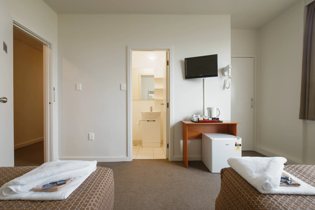 Kiwi International Hotel - Chambres