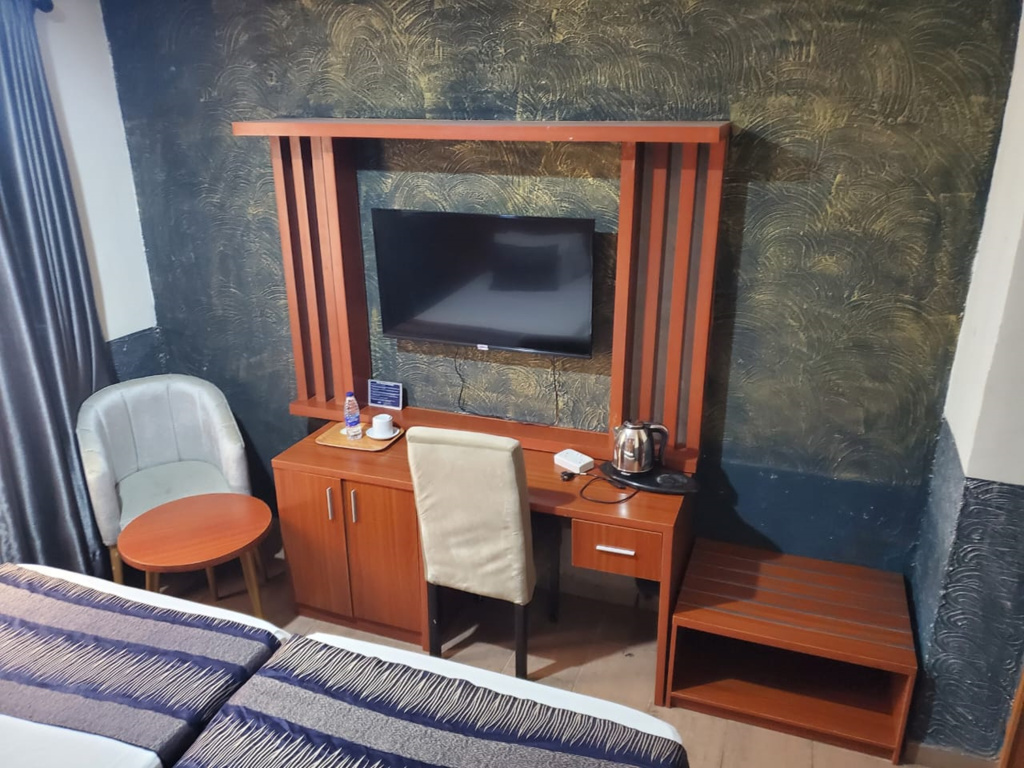 Chida International Hotel - Chambres
