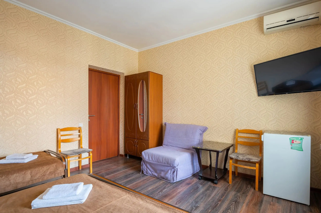 Standard Triple room with balcony and with city view
