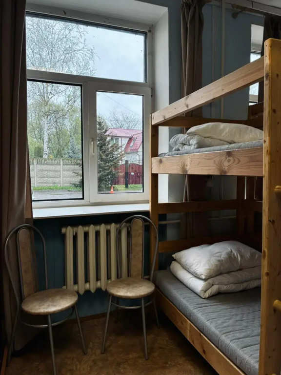 Bed in Dorm with courtyard view