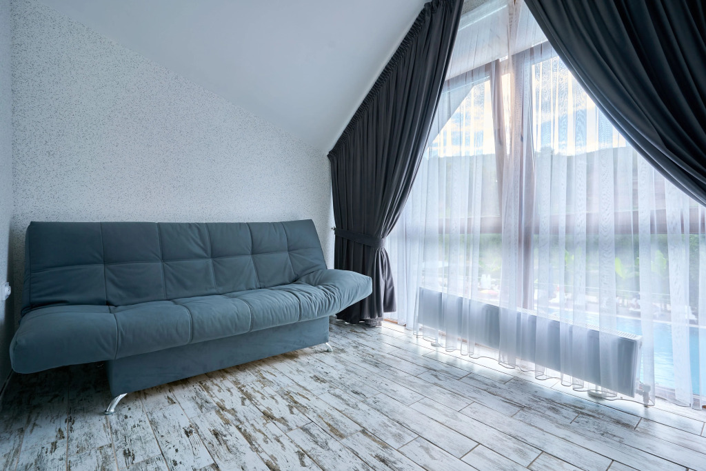 Двухместный номер Comfort с 2 комнатами с видом на реку двуспальная кровать в Белла