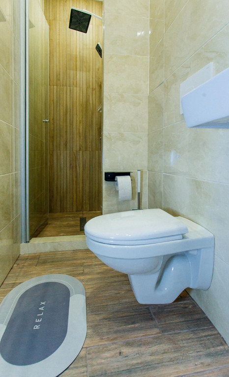 Четырёхместные апартаменты с 3 комнатами с балконом в Валентина