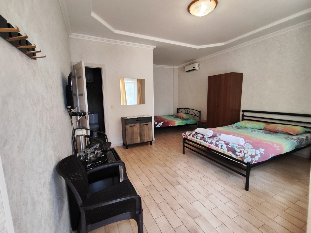 Четырёхместный номер Comfort с красивым видом из окна в Фазенда