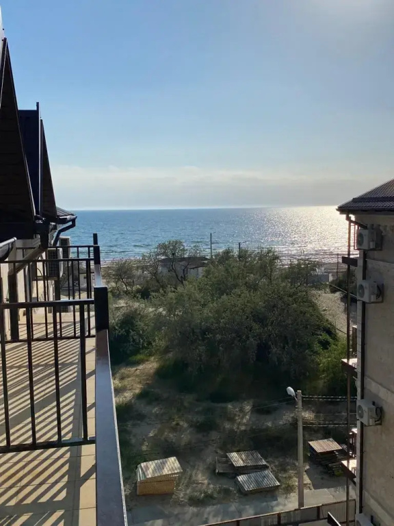 Standard Triple room with balcony and with partial sea view