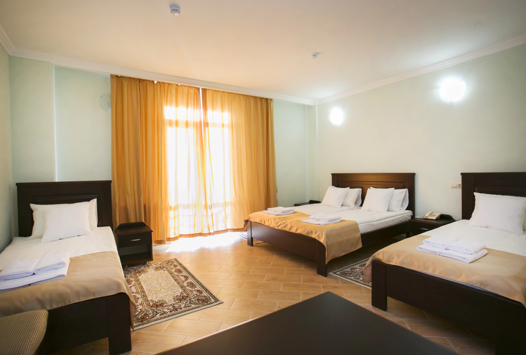Standard Quadruple room with balcony