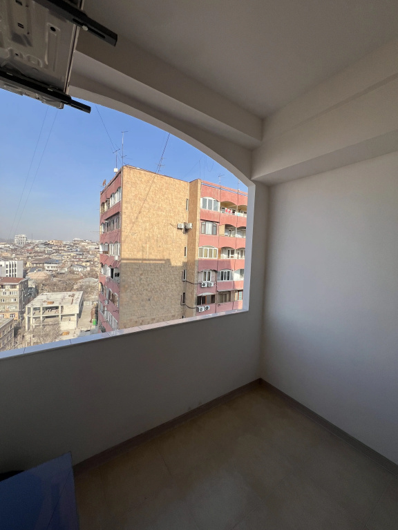 A two-bedroom apartment with a living room and a balcony in the city center Flat