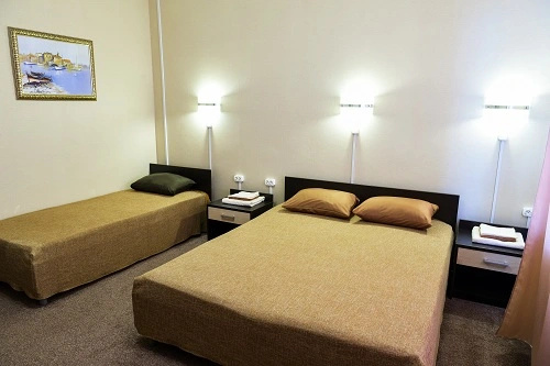 Standard Triple room with courtyard view