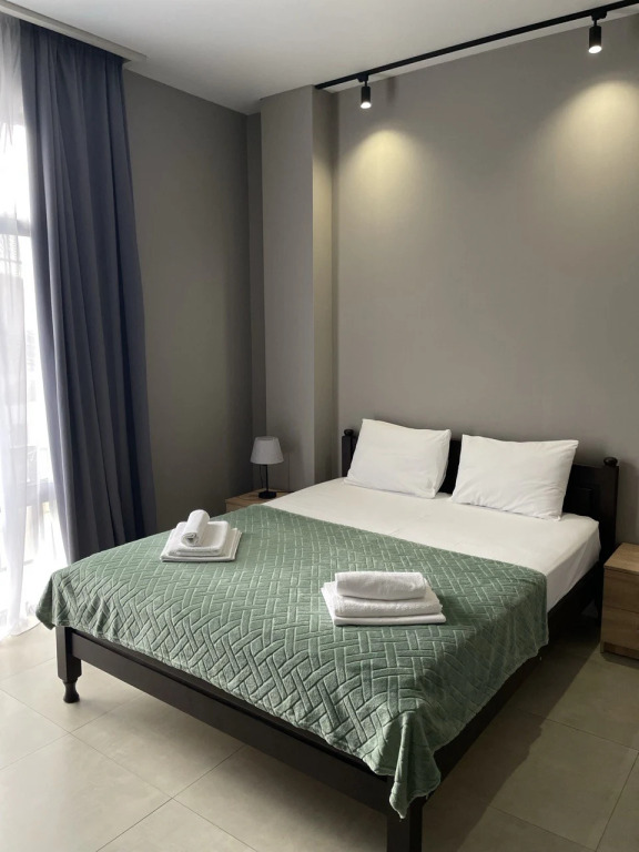 Двухместный люкс с балконом и с видом на горы двуспальная кровать в Maximus