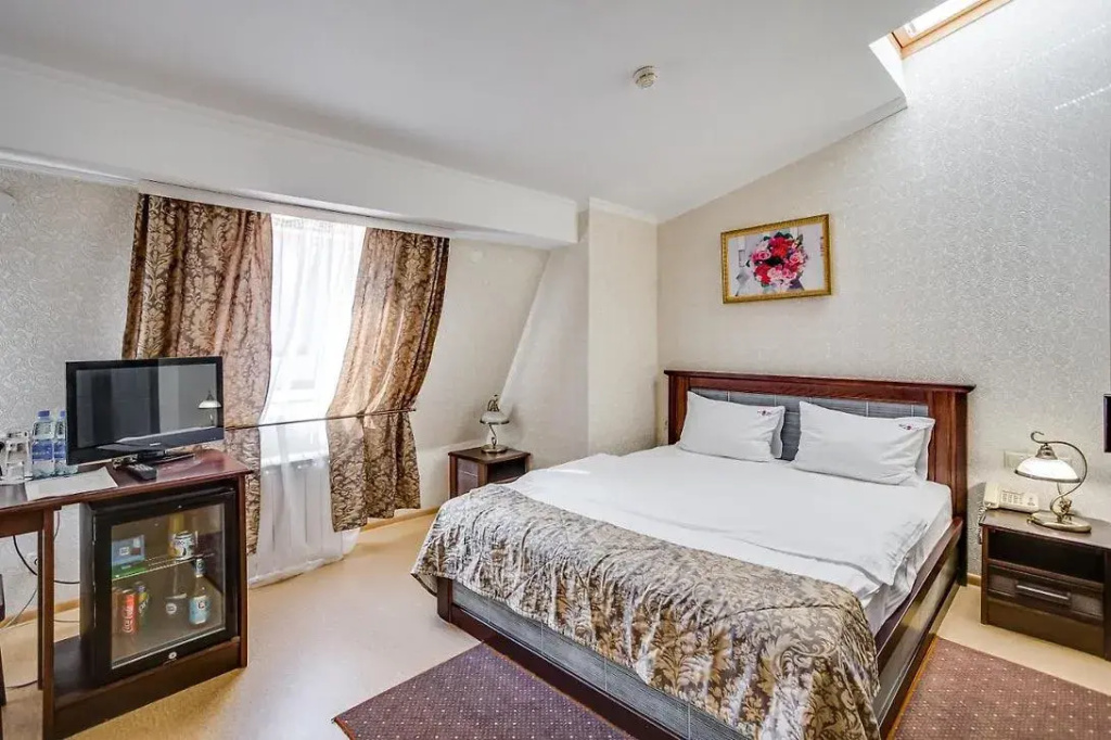 Siti Rouz Hotel Room Type - Double Attic Junior Suite full double bed