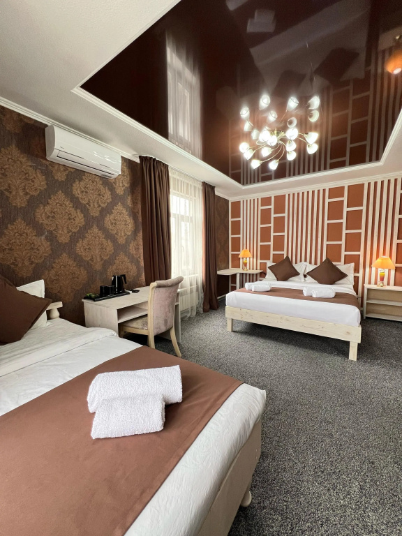 Kausar. Hotel - Chambres