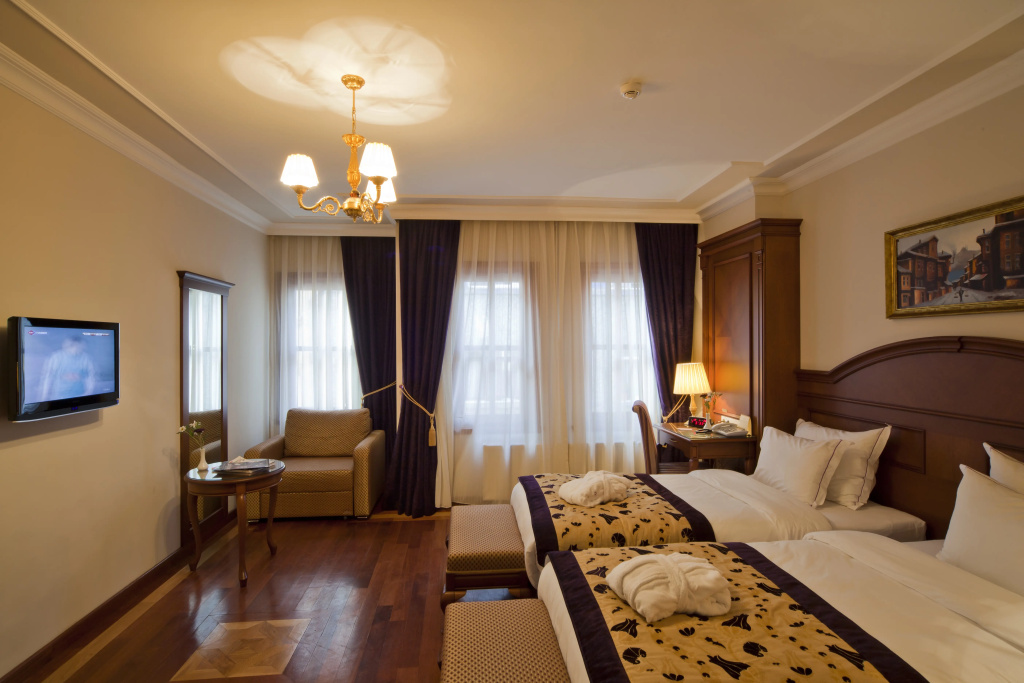 GLK Premier The Home Suites & Spa Hotel - Chambres