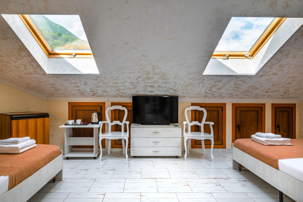 Vals Tsvetov Hotel Room Type - Deluxe Quadruple Attic room