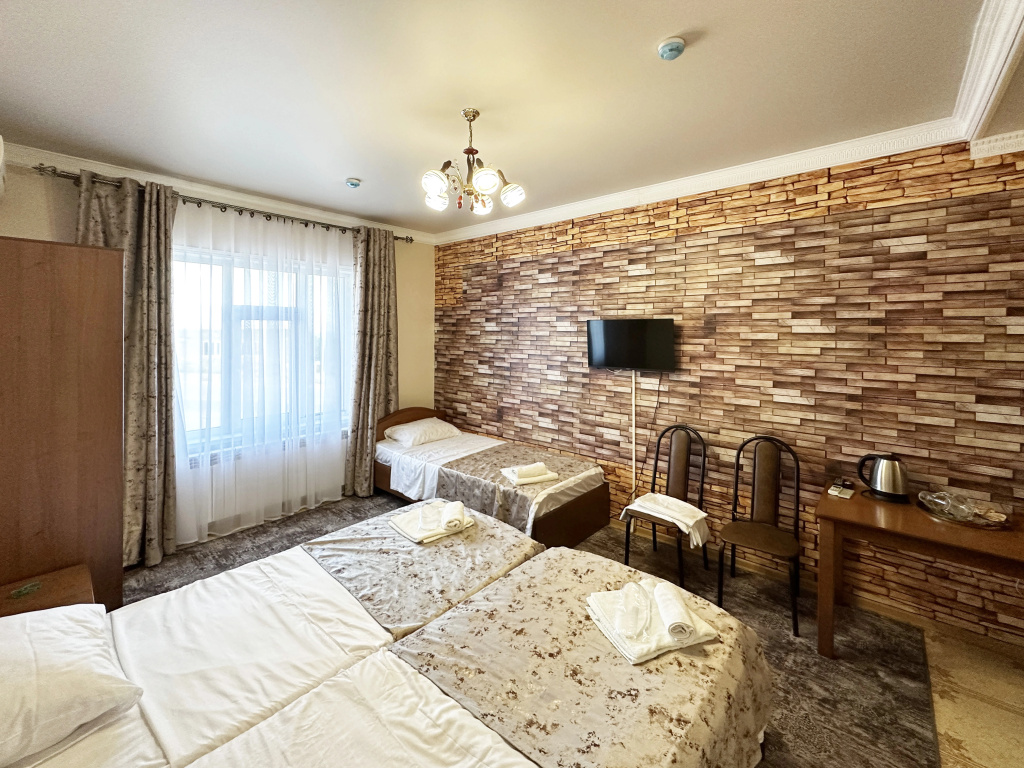 Standard Triple room with sea view