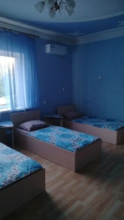 Кровать в общем номере в Центральный
