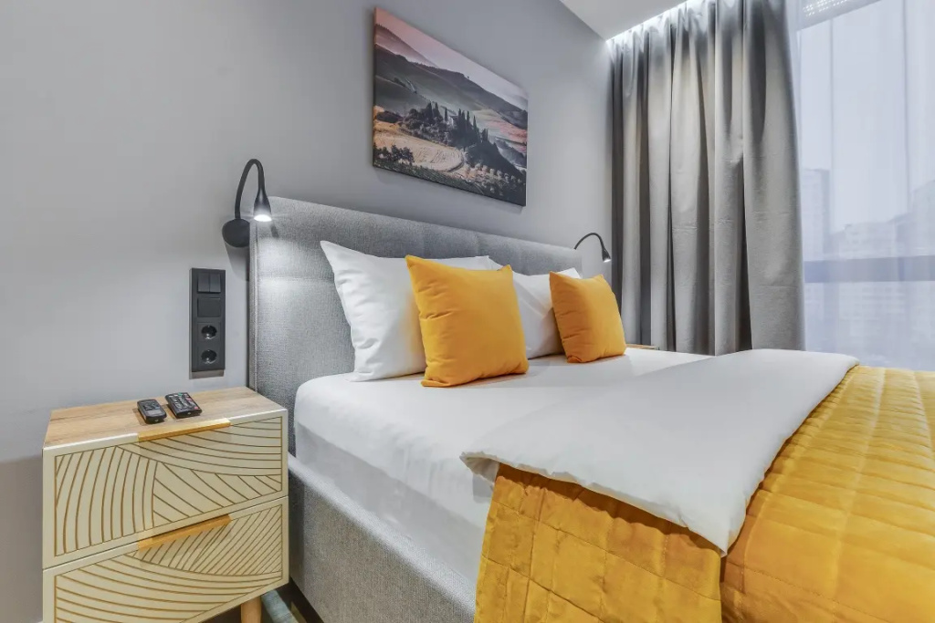 Апартаменты Трёхместные Делюкс с Видом на Город Business Apartments — фото