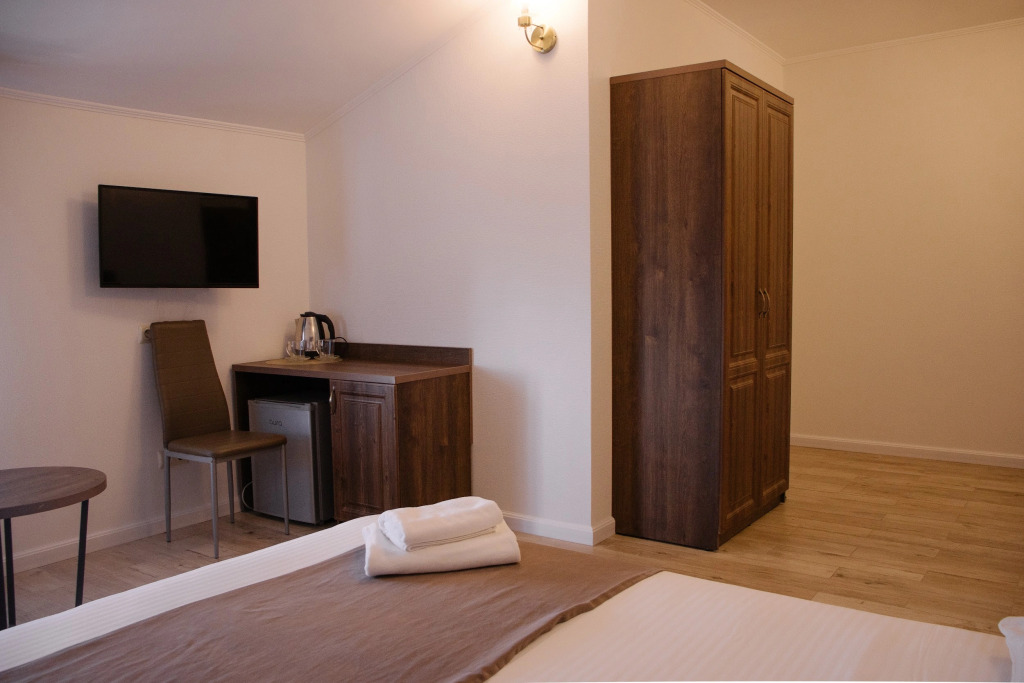 Трёхместный номер Standard Мансарда в Талион