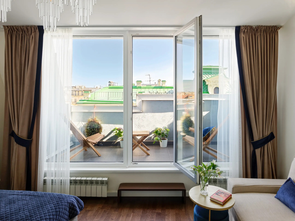Апартаменты Minin Apartments Мансарда с двумя балконами на Невском 80 кв.м. — фото