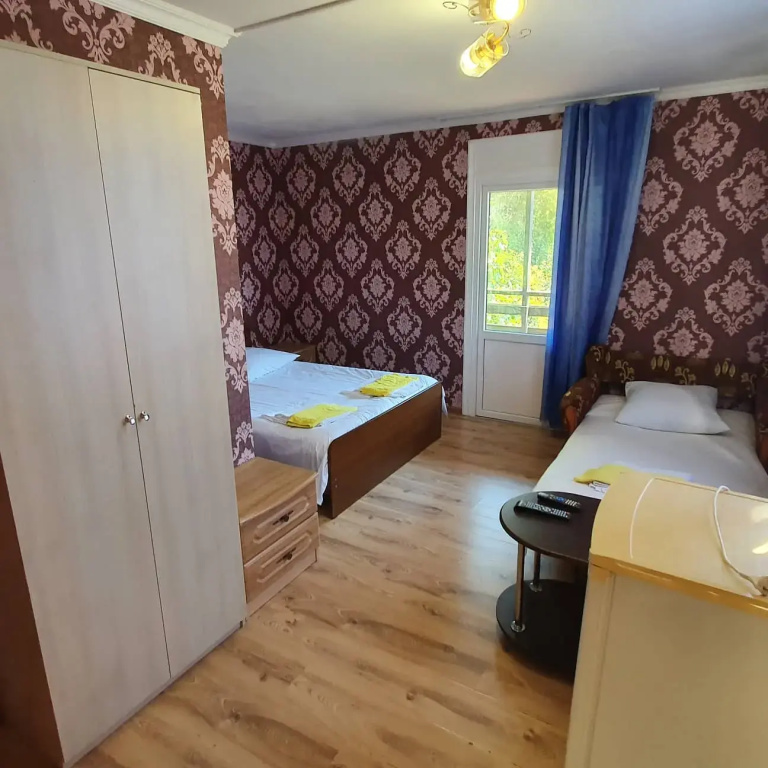 Standard Triple room with balcony and with sea view
