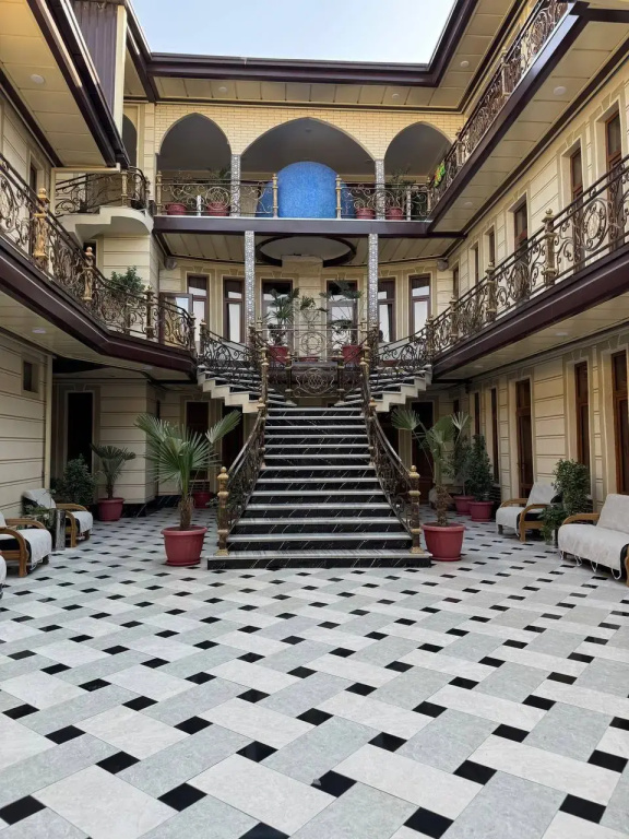 Grand House Real Estate Hotel