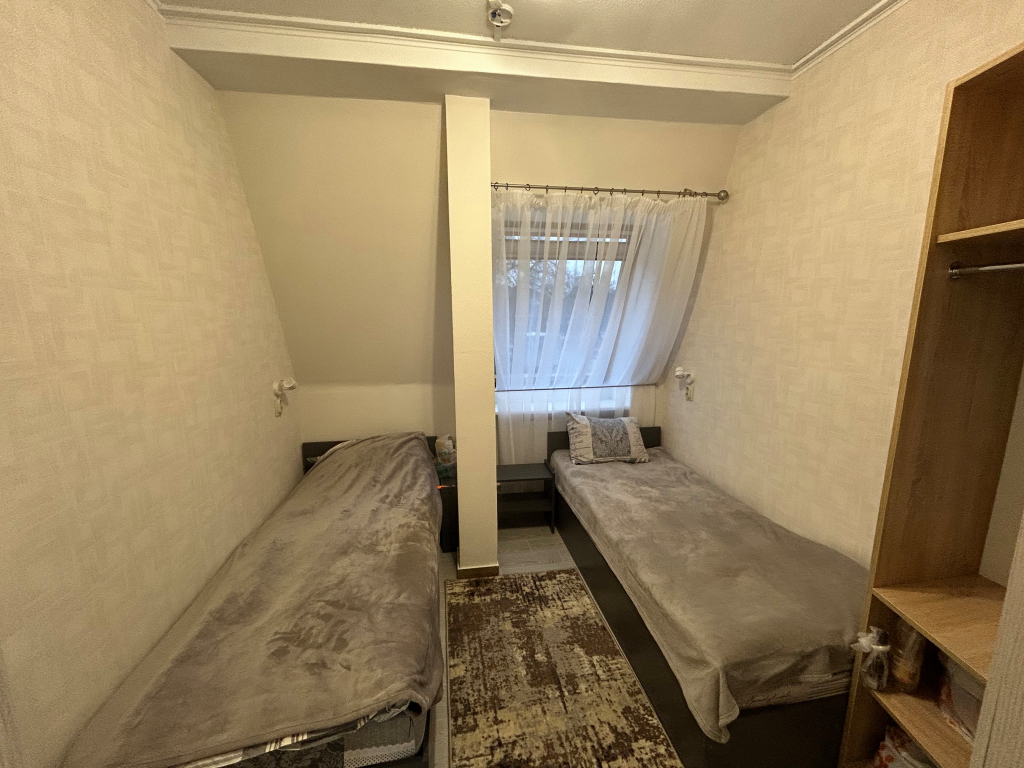 Кровать в общем номере в Пад дахам