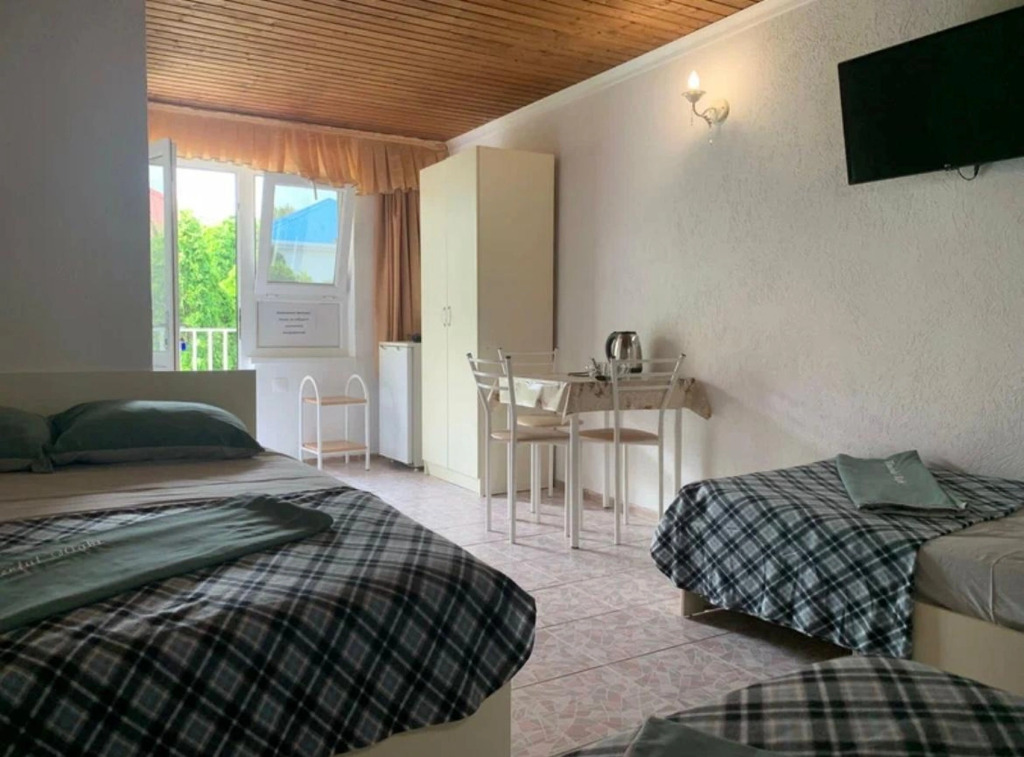 Четырёхместный номер Superior в Гармония