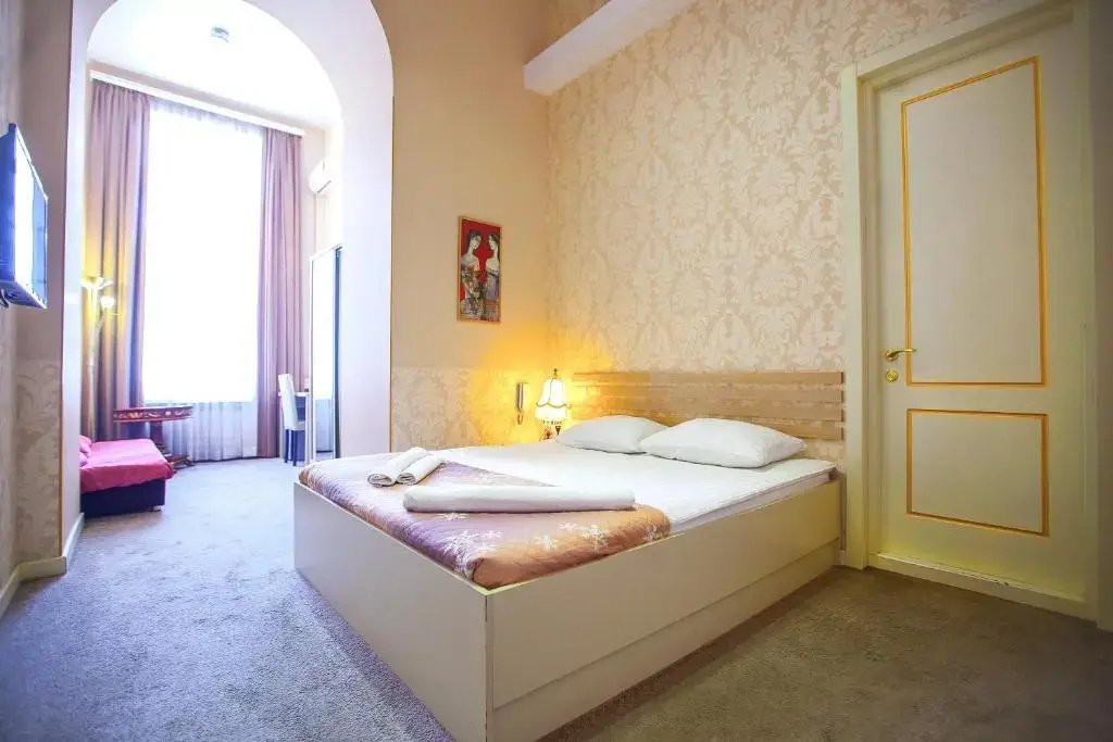 Superior Triple room with garden view