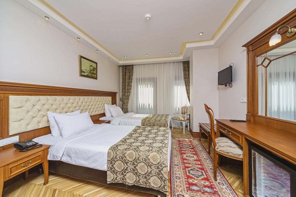 Spectra Hotel - Chambres