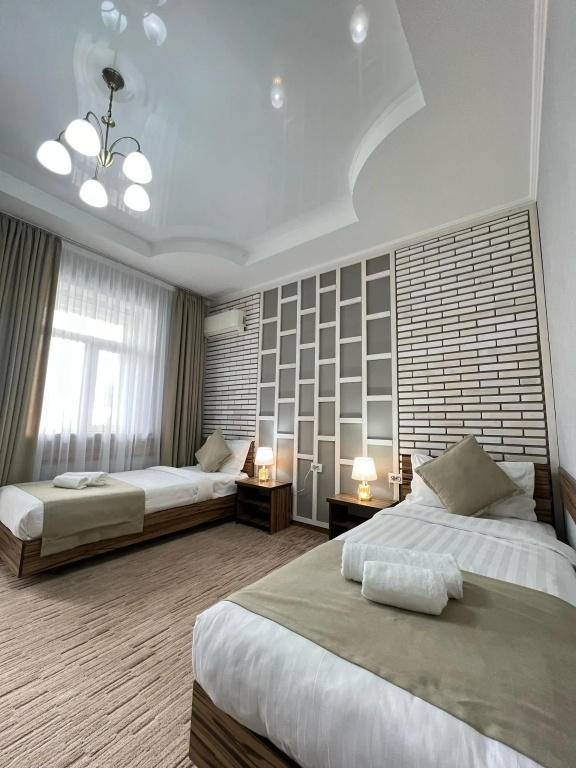 Kausar. Hotel - Chambres