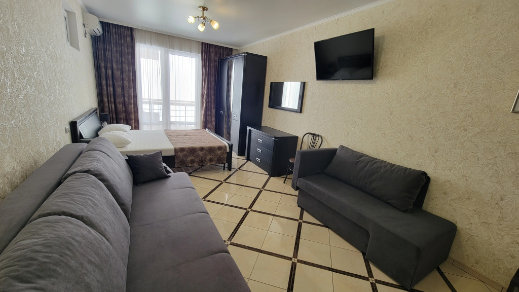 Четырёхместный номер Comfort с балконом в Милена