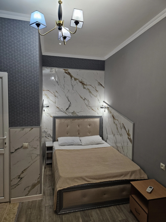 Standard Triple room beachfront