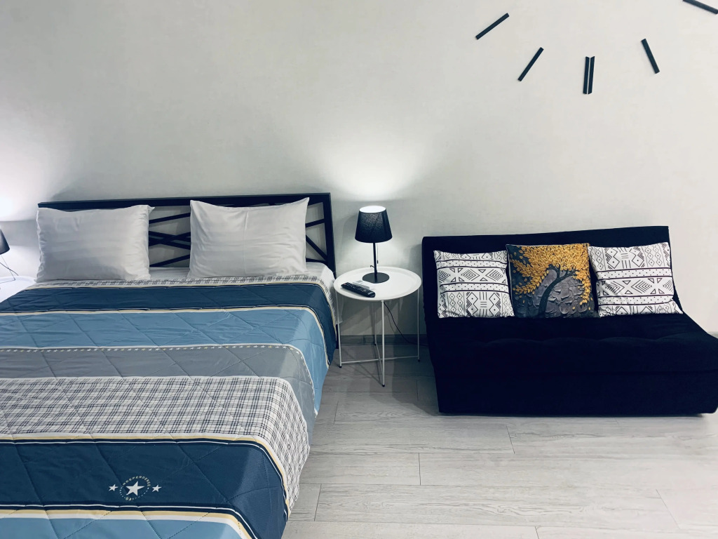 Квартира Уютная студия с панорамными окнами - фото 8