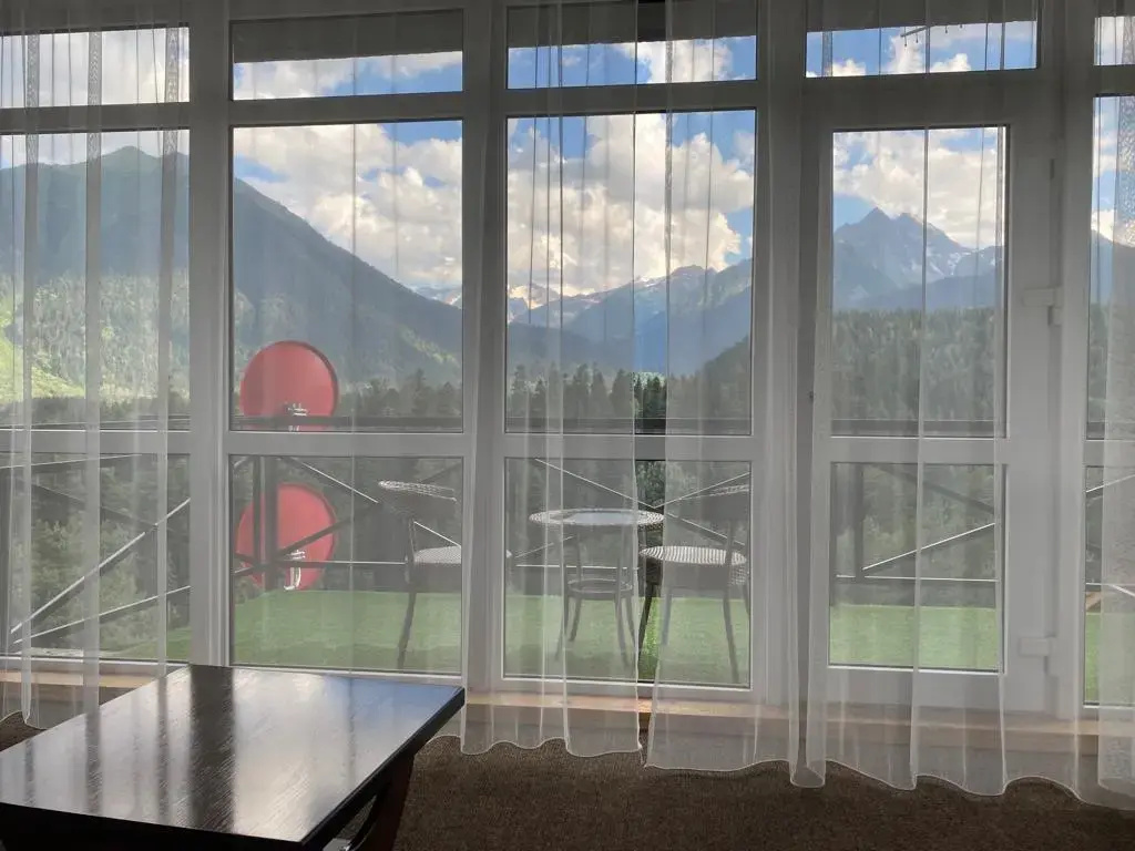 Suite with balcony and with panoramic mountain view