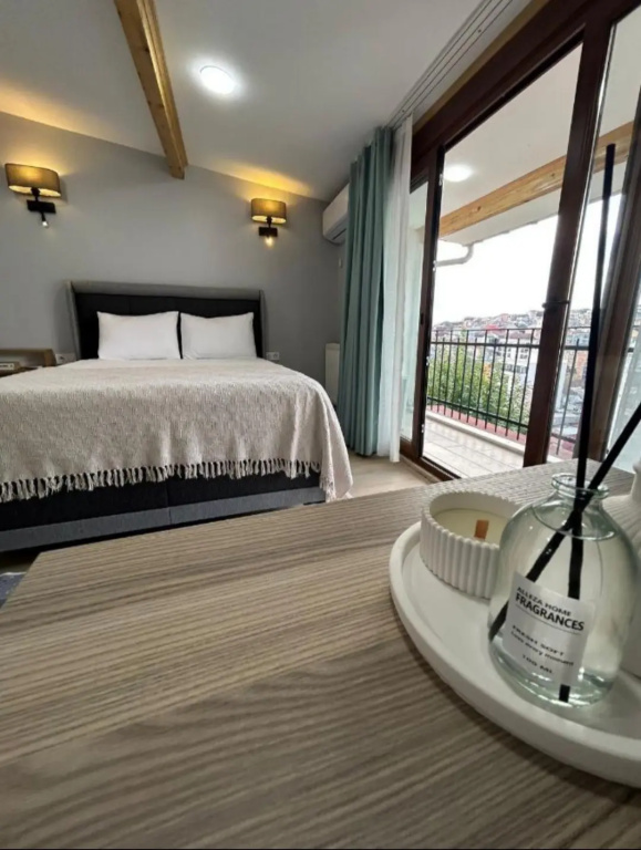 Double Suite with balcony and with city view (full double bed)