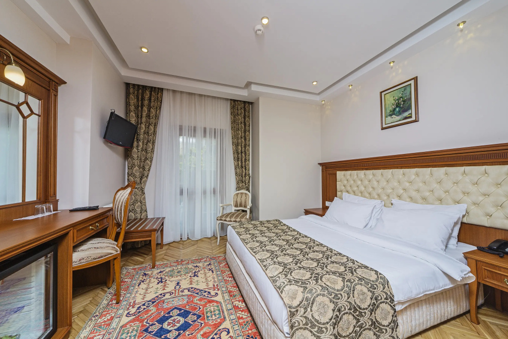 Spectra Hotel - Chambres