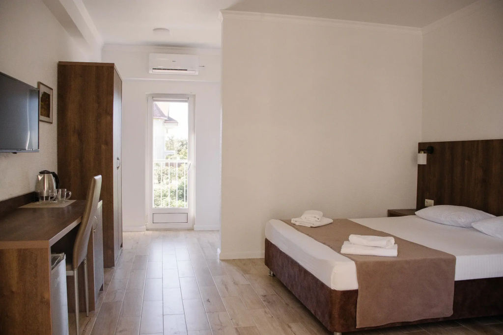 Deluxe Triple room with balcony