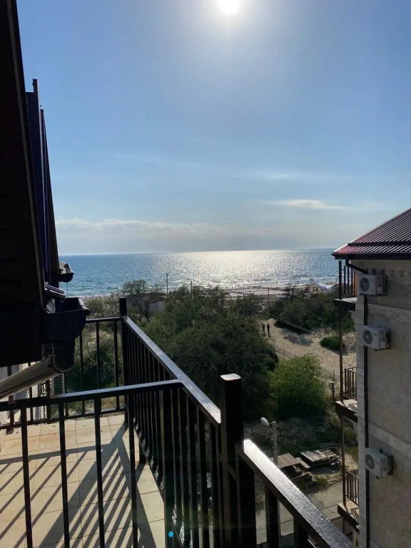 Standard Quadruple room with balcony and with partial sea view