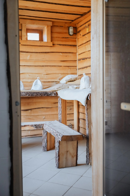 Двухместный коттедж с 3 комнатами с красивым видом из окна двуспальная кровать в Банный остров