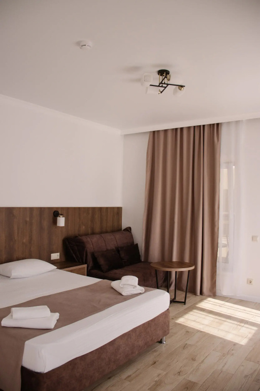 Deluxe Triple room with balcony and with sea view