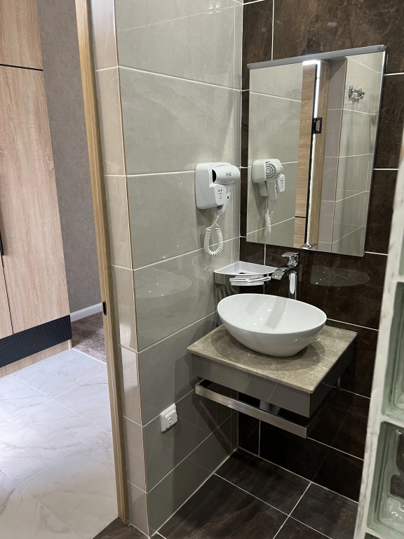 Четырёхместный номер Deluxe с балконом в Отель Столица