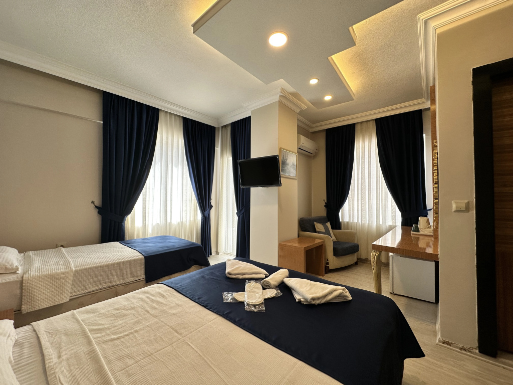 Superior Triple room with balcony and with view