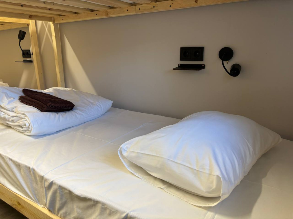 Bed in Dorm with courtyard view